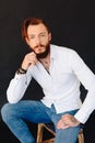 Studio photo of a beautiful young man with a beard Royalty Free Stock Photo