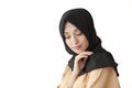 Studio photo of a beautiful young woman eastern type full-length, on a light background, dressed in the Muslim style Royalty Free Stock Photo