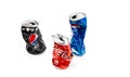 Studio photo of empty and crashed Pepsi and Cola aluminum cans Royalty Free Stock Photo