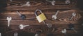 Studio photo of a lock with a broken key in it on a wooden background. Lots of other new keys around the lock Royalty Free Stock Photo