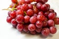 A Close-up Photograph of a Bunch of Red Grapes