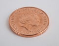 An English one penny coin on a white background