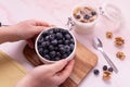 woman hands holding a bowl of blueberries Royalty Free Stock Photo