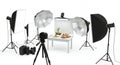 A Studio Photography Setup with Professional Lighting Equipment, Camera on Tripod, and a Table with Various Food Items Royalty Free Stock Photo