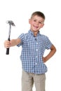 Studio picture of a beautiful builder boy, dressed in blue checkered shirt, holding a hammer in his hand