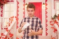 Studio picture from a young man with handkerchief. Sick guy has runny nose. man makes a cure for the common cold Royalty Free Stock Photo