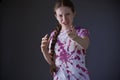 Studio Portrait Of Angry And Frustrated Teenage Girl Shouting At Camera