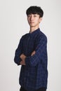 Studio portrait of an Asian young man with disappointment at something Royalty Free Stock Photo