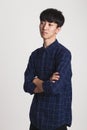 Studio portrait of an Asian young man with disappointment at something Royalty Free Stock Photo
