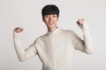 A studio portrait of an Asian youth expressing confidence Royalty Free Stock Photo