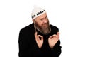 Studio portrait of bearded orthodox jewish man. Cheerful smiling charismatic jew with sidelocks in white yarmulke