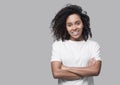 Studio isolated portrait of a beautiful young woman, African american girl with crossed arms looking at camera. Royalty Free Stock Photo