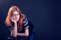 Studio portrait of the beautiful young woman with ginger hair Royalty Free Stock Photo