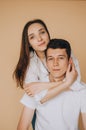 Studio portrait of caucasian couple of beautiful young woman with long blonde hair in red sexy dress and high heels and brunette Royalty Free Stock Photo