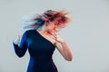 Studio portrait of cheerful fashion hipster girl dancing Royalty Free Stock Photo