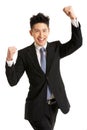 Studio Portrait Of Chinese Businessman Celebrating