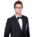 Studio portrait, fashion and confident man in tuxedo, formal evening wear or elegant outfit on white background. Suit Royalty Free Stock Photo