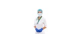 Studio portrait of female doctor on white isolated background. The doctor is wearing a white coat, a medical mask, blue styryl Royalty Free Stock Photo