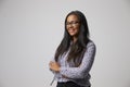 Studio Portrait Of Female Fashion Buyer Wearing Spectacles