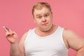 Happy plump man with shaving foam on his face and razor isolated on pink Royalty Free Stock Photo