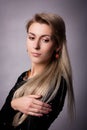 Studio portrait of girl with thoughful look