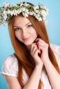 Studio portrait of a girl in wreath of flowers Royalty Free Stock Photo