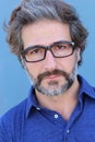 Studio Portrait of a handsome businessman wearing glasses looking to the camera Royalty Free Stock Photo