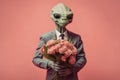 Studio portrait of happy alien in a business suit holding flowers, created with Generative AI technology