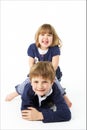 Studio Portrait Of Happy Brother And Sister Royalty Free Stock Photo