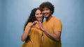 Studio portrait happy couple diverse multiracial man woman love joined fingers making heart shape St Valentines Day Royalty Free Stock Photo