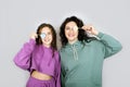 Studio Portrait of happy family mom and teenager daughter spend time together Royalty Free Stock Photo