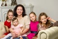 Studio Portrait of Happy Family of Mother and Three Daughters Royalty Free Stock Photo