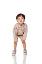 A studio portrait of a happy and playful asian boy child