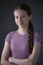 Low Key Studio Portrait Of Happy Smiling And Confident Teenage Girl Looking At Camera Royalty Free Stock Photo