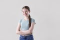 Studio Portrait Of Happy Smiling And Confident Teenage Girl Looking At Camera Royalty Free Stock Photo