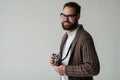 Studio portrait of hipster photographer