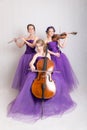Musical trio in evening gowns Royalty Free Stock Photo