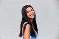 Studio Portrait Of Positive Happy Young Woman Smiling At Camera