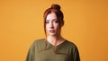 portrait of pretty young woman with red hair bun and curtain bangs