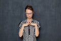 Portrait of serious focused young woman with glasses Royalty Free Stock Photo