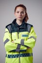 Studio Portrait Of Serious Young Female Paramedic Against Plain Background Royalty Free Stock Photo