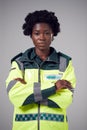 Studio Portrait Of Serious Young Female Paramedic Against Plain Background Royalty Free Stock Photo