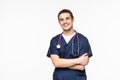 Studio portrait shot of male doctor standing with arms crossed at isolated white background with copy space Royalty Free Stock Photo