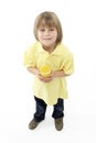 Studio Portrait of Smiling Boy Holding Glass of Fr Royalty Free Stock Photo