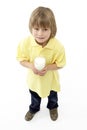 Studio Portrait of Smiling Boy Holding Glass of Mi Royalty Free Stock Photo