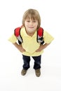 Studio Portrait of Smiling Boy Holding Ruck Sack