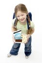 Studio Portrait of Smiling Girl Holding Lunchbox