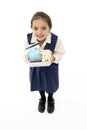 Studio Portrait of Smiling Girl Holding Lunchbox Royalty Free Stock Photo