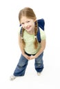 Studio Portrait of Smiling Girl Wearing School Bag Royalty Free Stock Photo