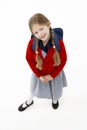 Studio Portrait of Smiling Girl Wearing School Bag Royalty Free Stock Photo